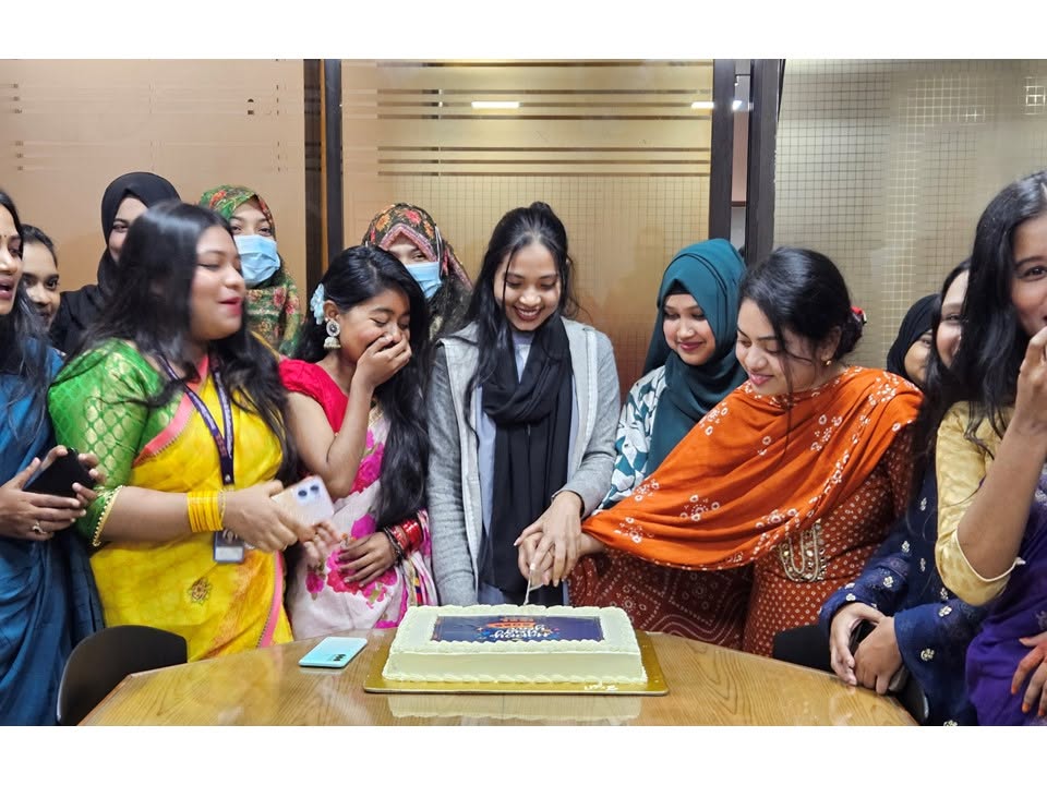 Office cake-cutting celebration at ISSL